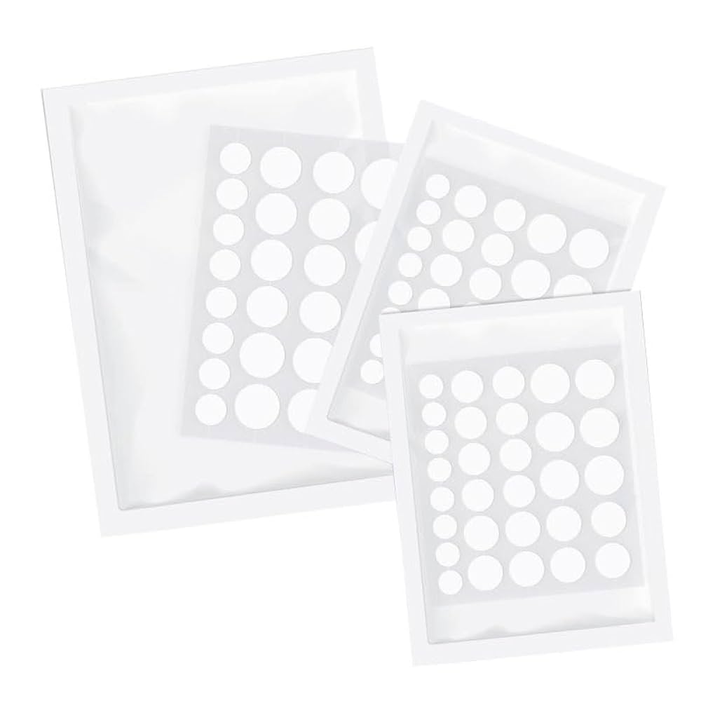 Three sheets of clear hydrocolloid Norse Organics acne patches in assorted sizes