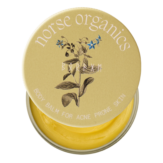 Open Body Balm for Acne Prone Skin jar with botanical lid art and yellow natural balm